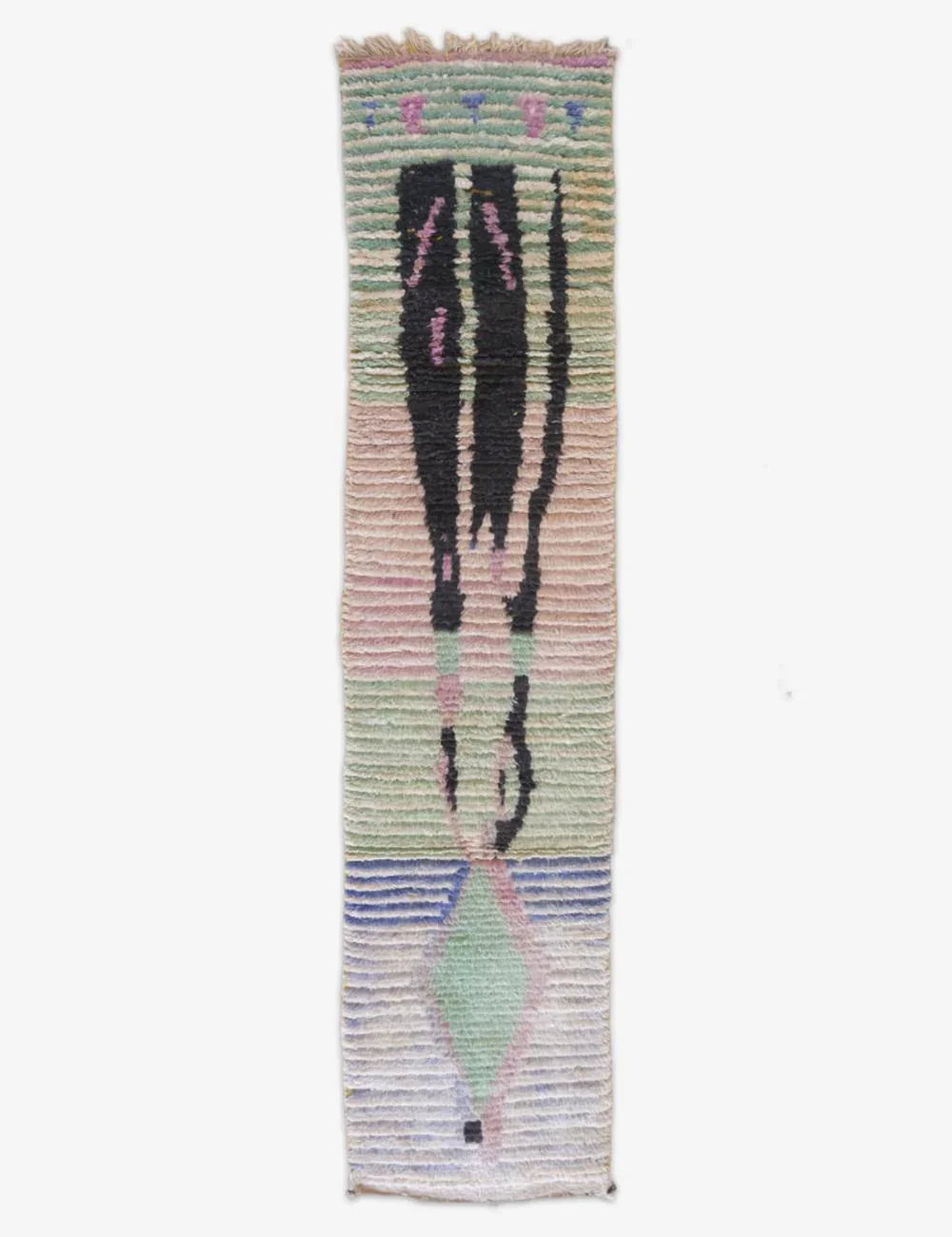 Textile art piece with abstract design on a white background