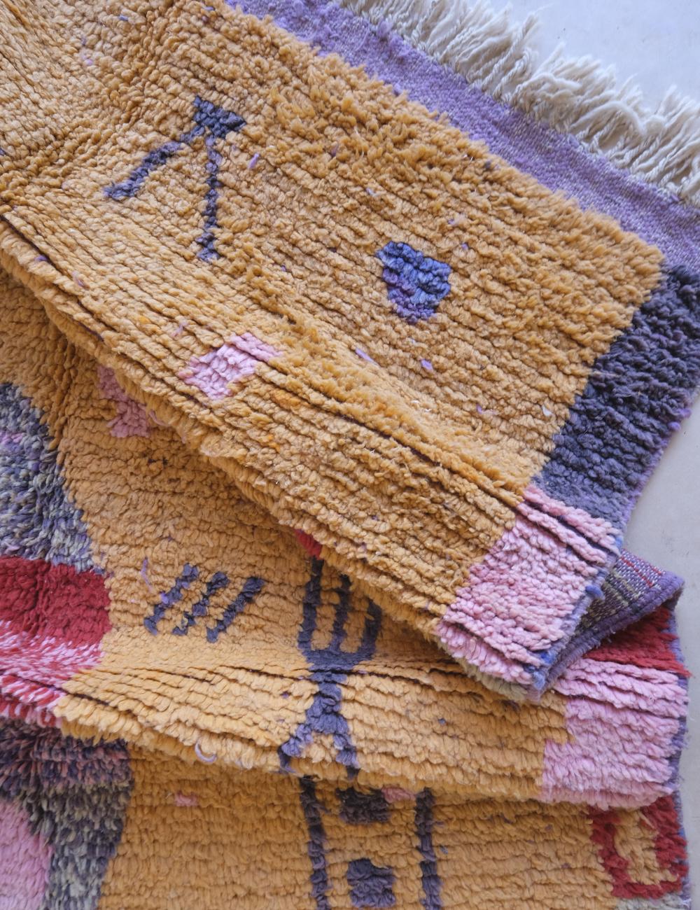 Textile with abstract patterns and colors on a plain background