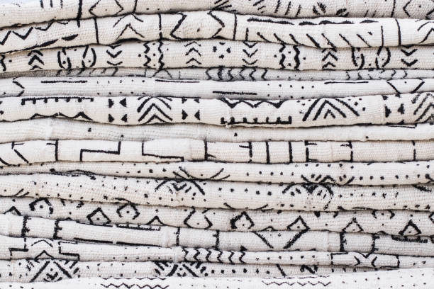The Story Behind Bògòlanfini: How Mudcloth is Dyed with River Mud and Herbs