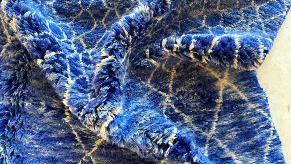 Deep blue Moroccan Mrirt rug, abstract handwoven wool, shaggy texture, artisan-made in Khenifra