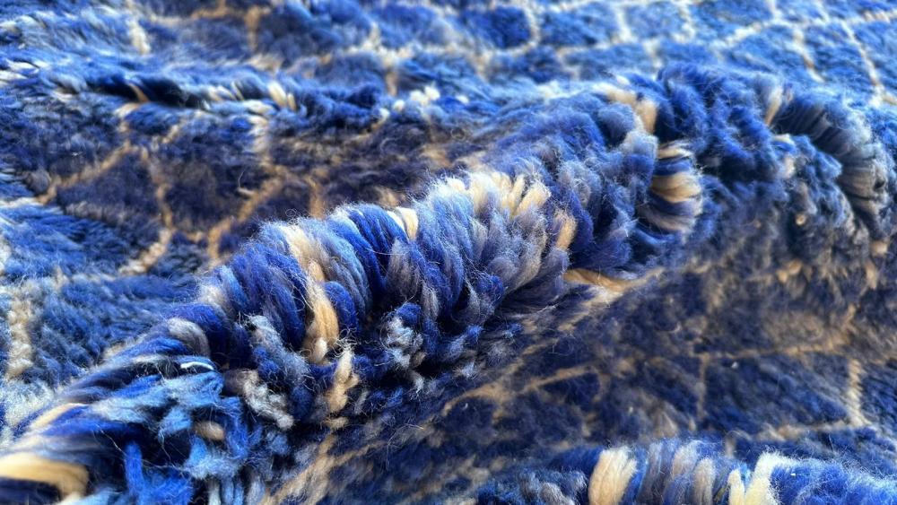 Deep blue Moroccan Mrirt rug, abstract handwoven wool, shaggy texture, artisan-made in Khenifra