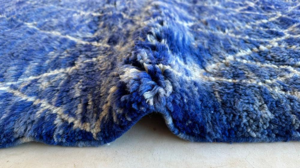 Deep blue Moroccan Mrirt rug, abstract handwoven wool, shaggy texture, artisan-made in Khenifra