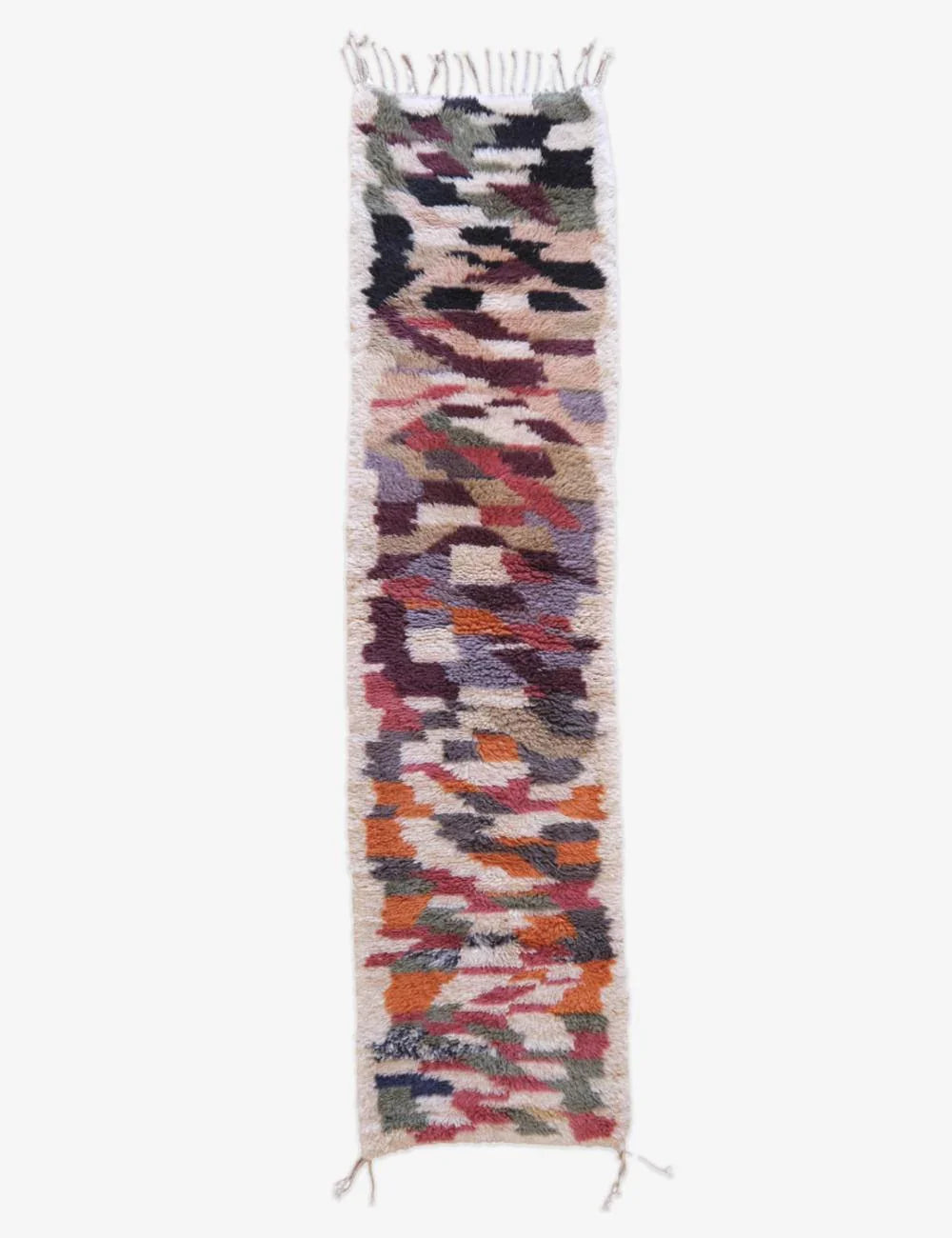 Multicolored woven wall hanging on a white background