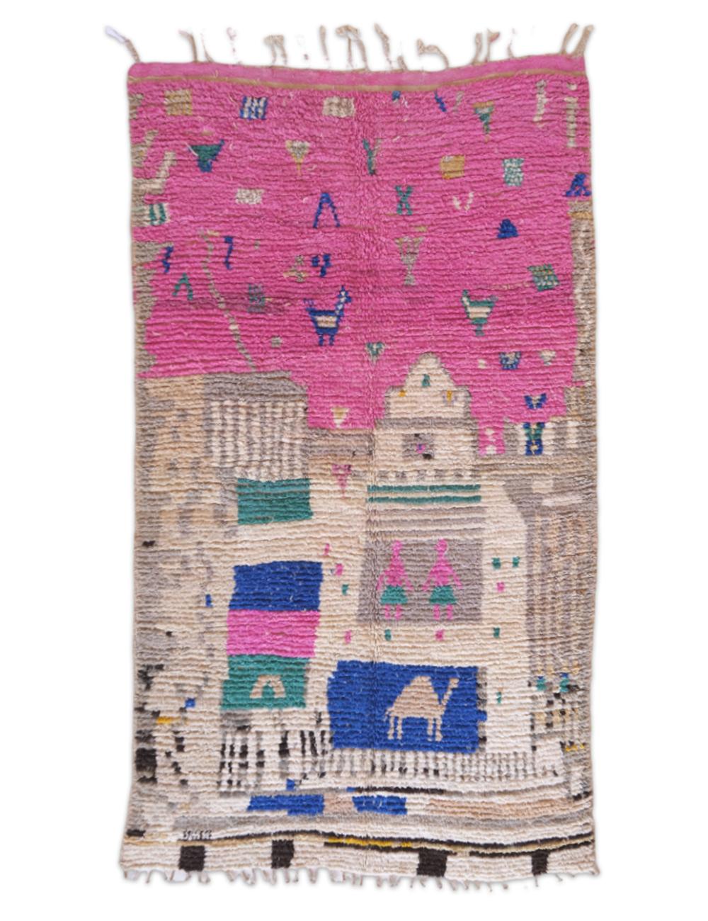 Handmade rug with colorful patterns on a white background